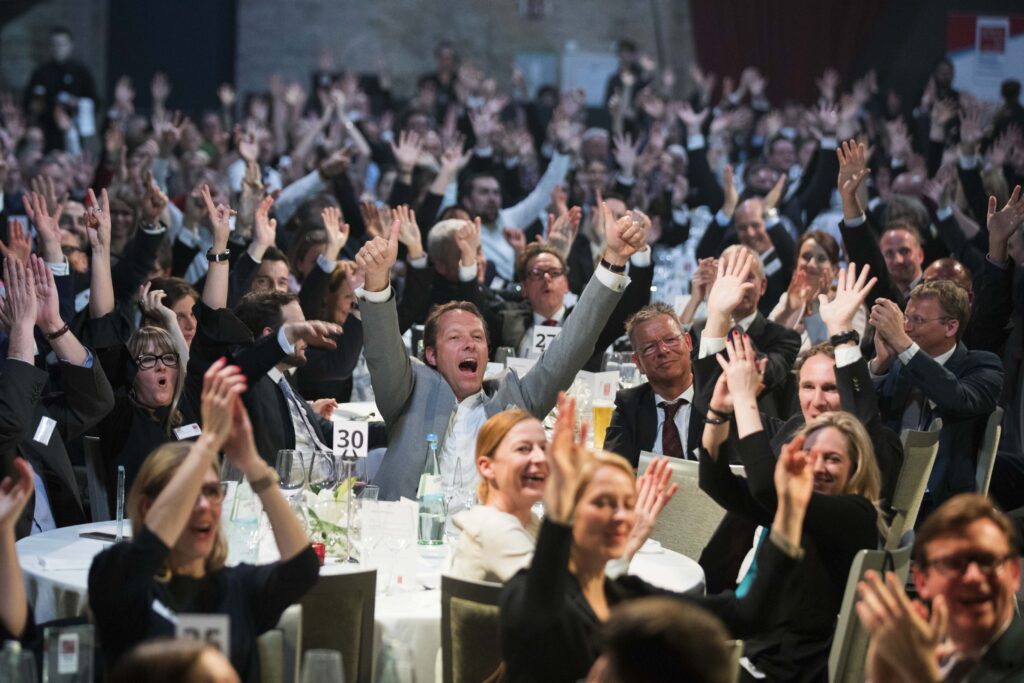 crowd of cheering people