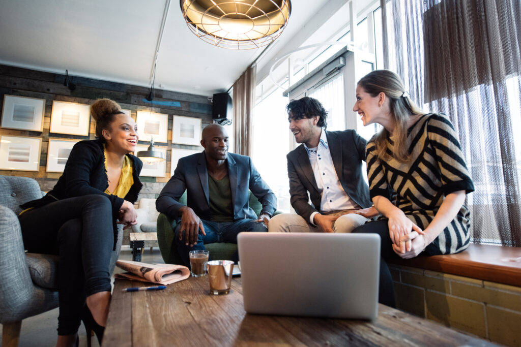 business meeting of four employees